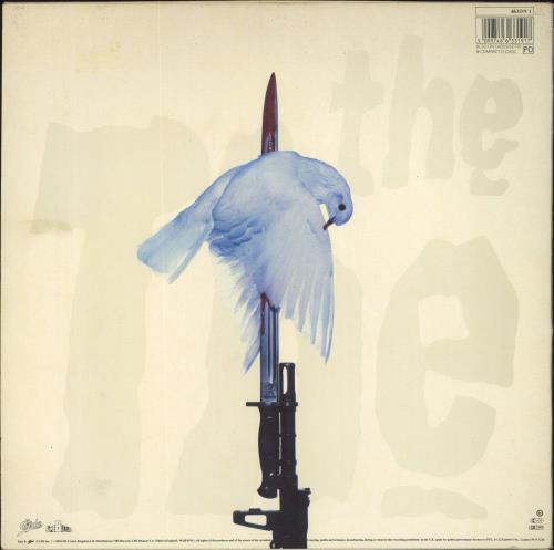 The The Mind Bomb + Poster UK vinyl LP album (LP record) (246431) The The Mind Bomb + Poster UK vinyl LP album (LP record) (246431)